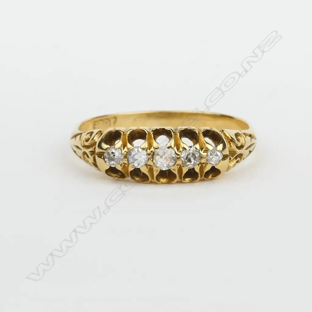 An estate 18ct.yellow gold and diamond dress ring Image 1++