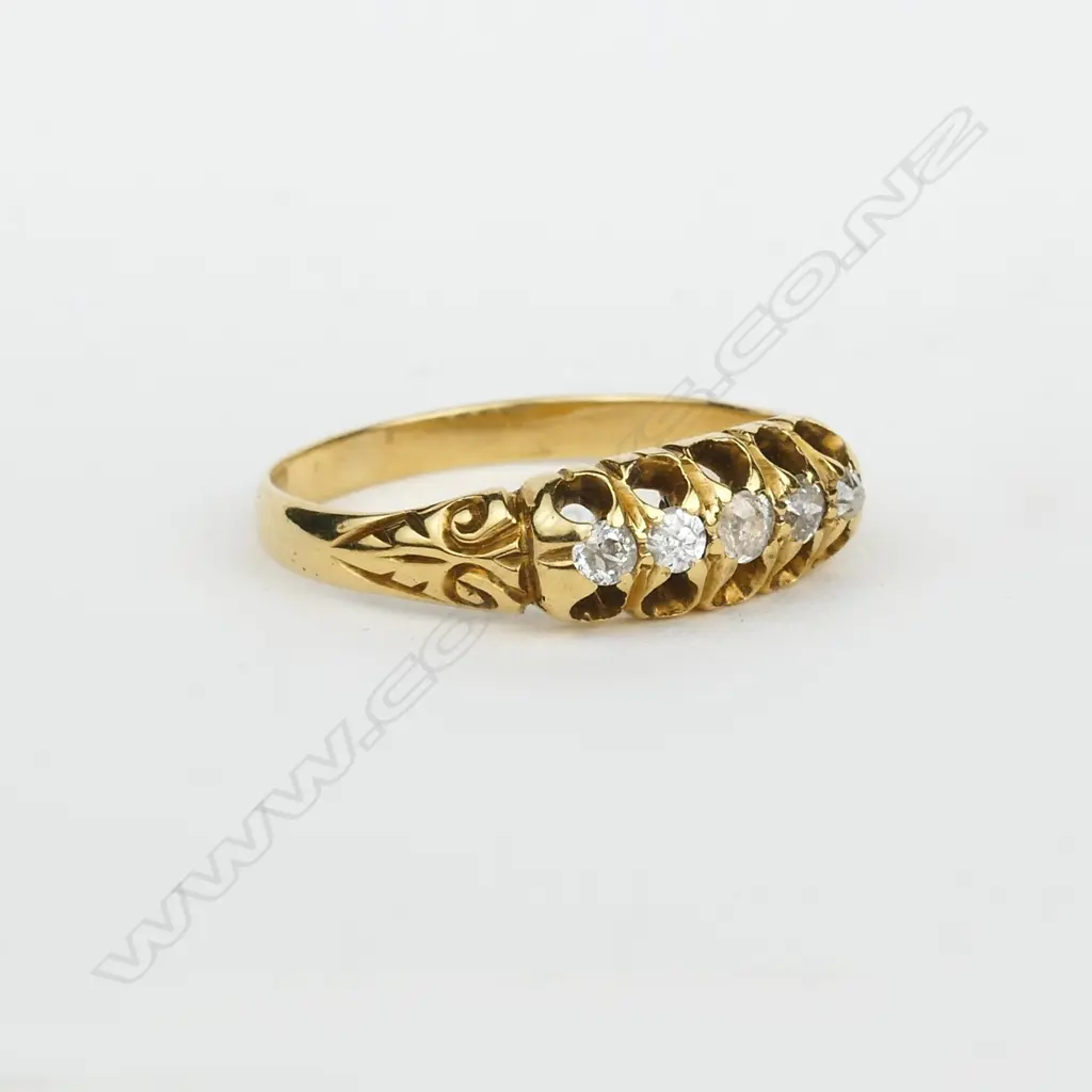 An estate 18ct.yellow gold and diamond dress ring Image 1++