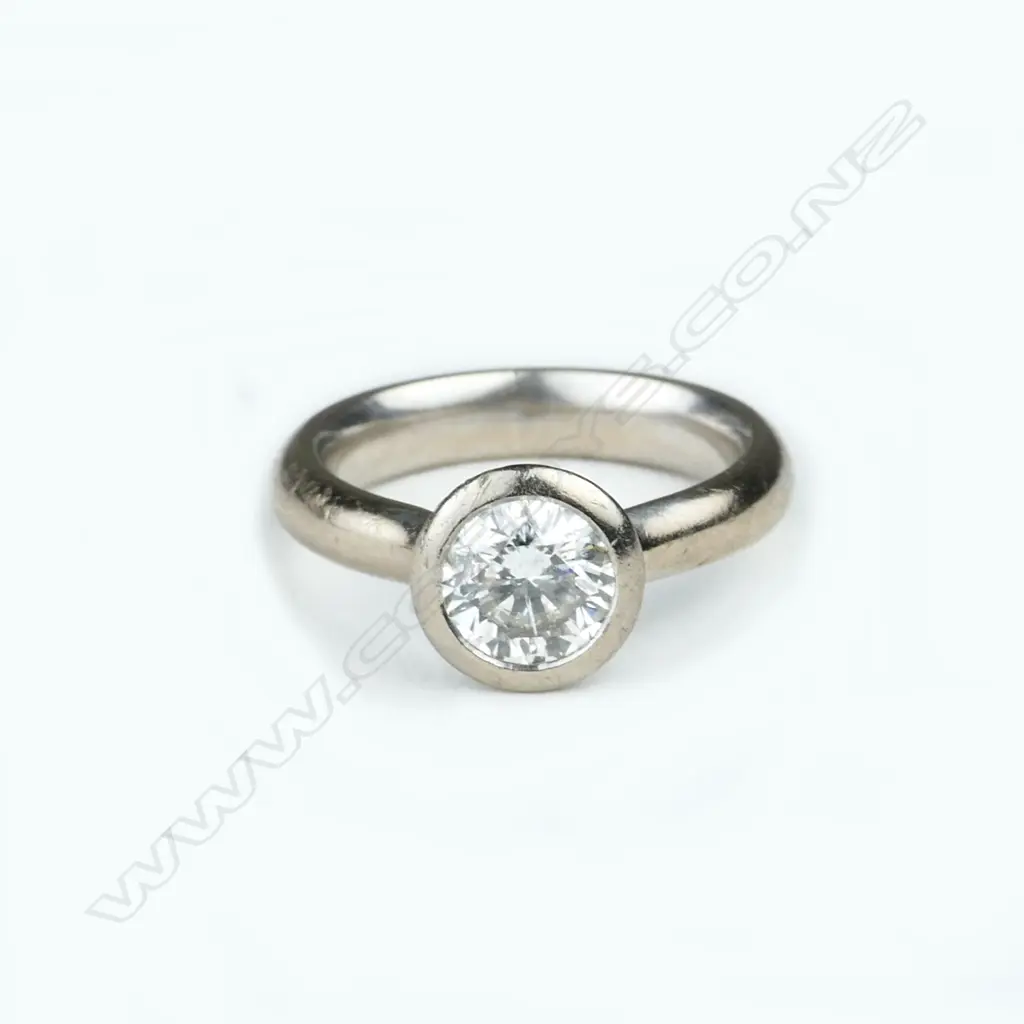 An 18ct. white gold and diamond solitaire ring Image 1++