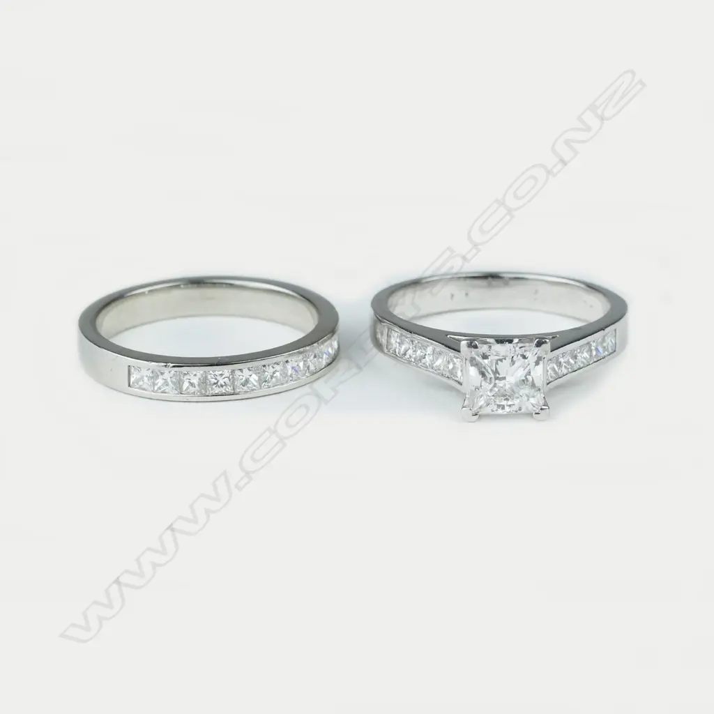 A platinum and diamond ring set Image 1++
