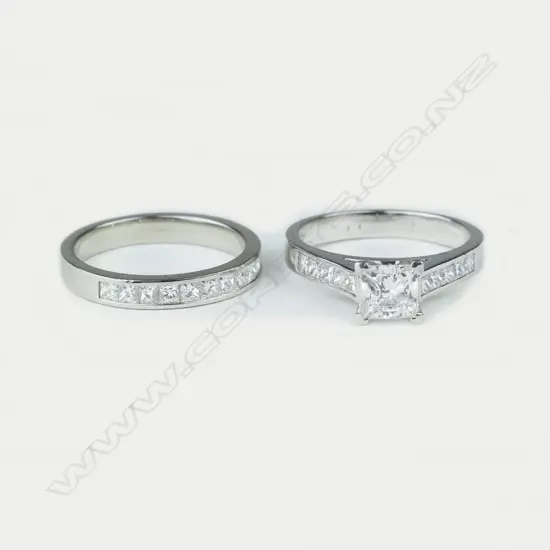 A platinum and diamond ring set