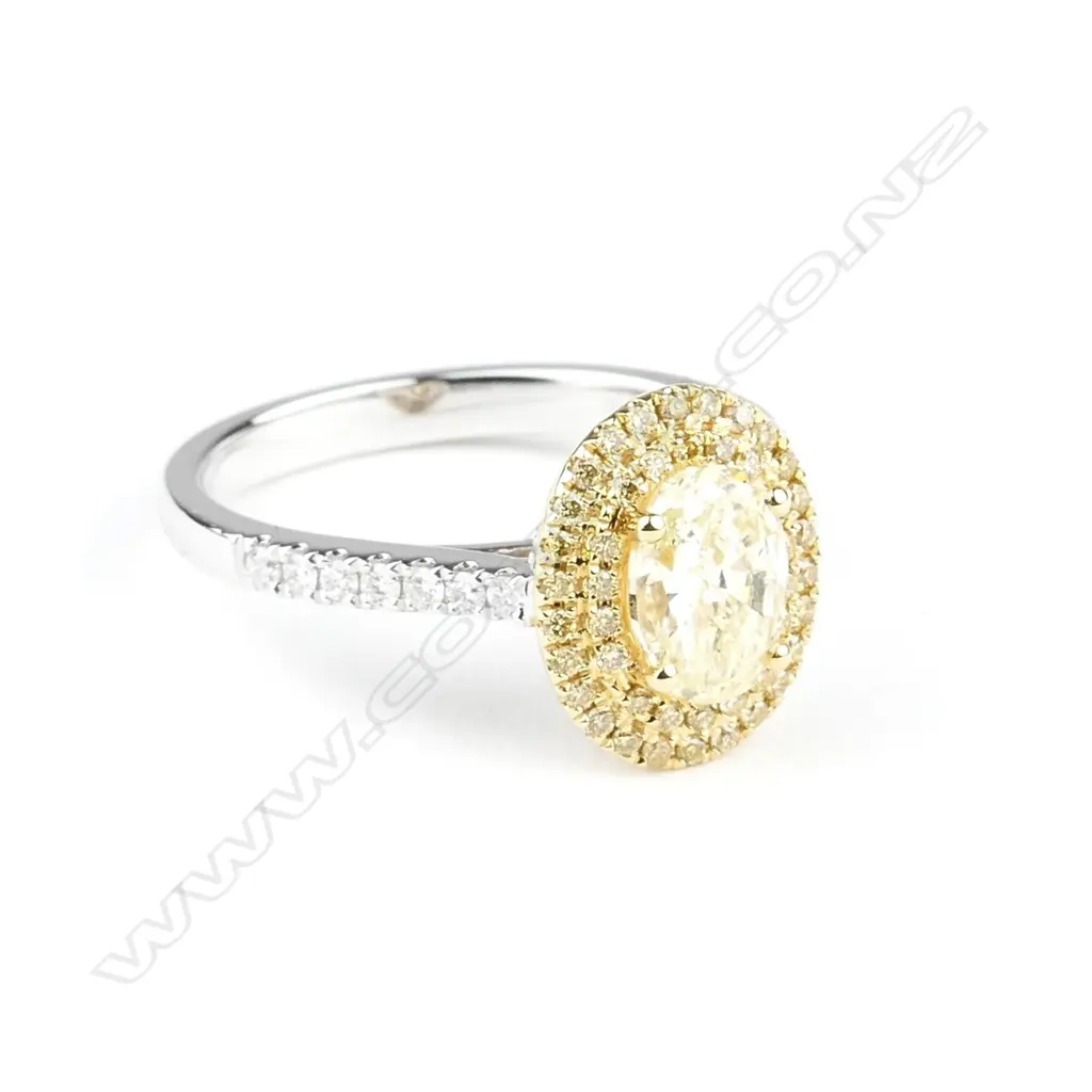 An 18ct. gold and diamond cluster ring Image 1++