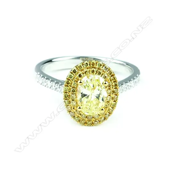 An 18ct. gold and diamond cluster ring