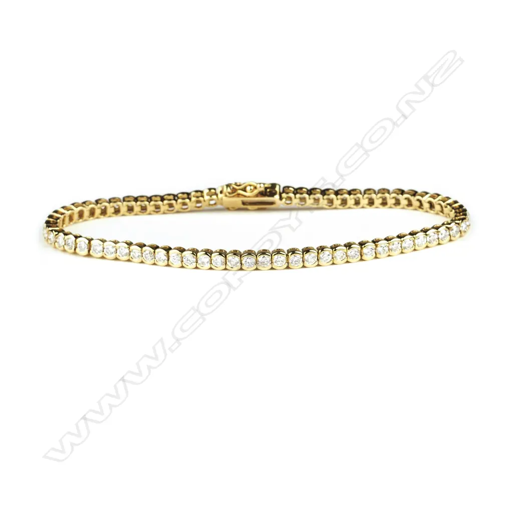 An 18ct. gold and diamond tennis bracelet Image 1++