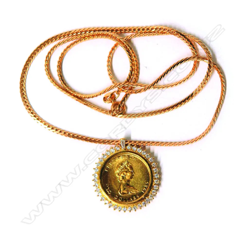 A Canadian ¼ gold maple coin pendant with diamond mount and chain Image 1++