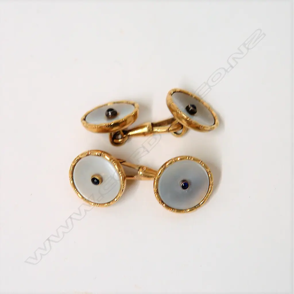 A pair of early 20thC 14ct. yellow gold and mother-of-pearl cufflinks Image 1++