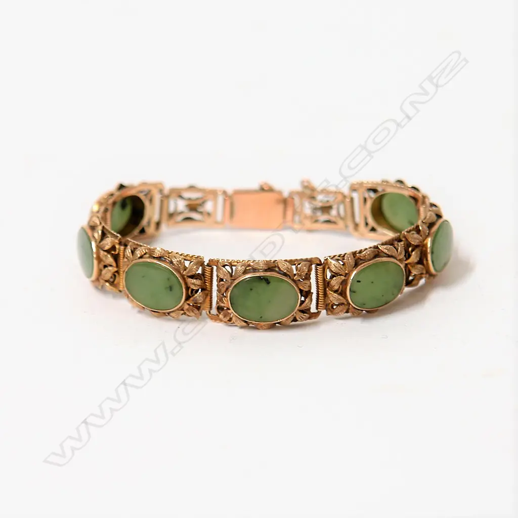 A good vintage 9ct. rose gold and pounamu bracelet Image 1++