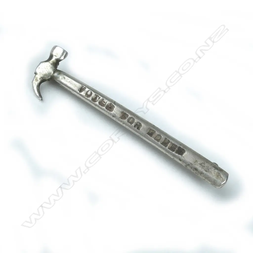 A small silver pin Image 1++