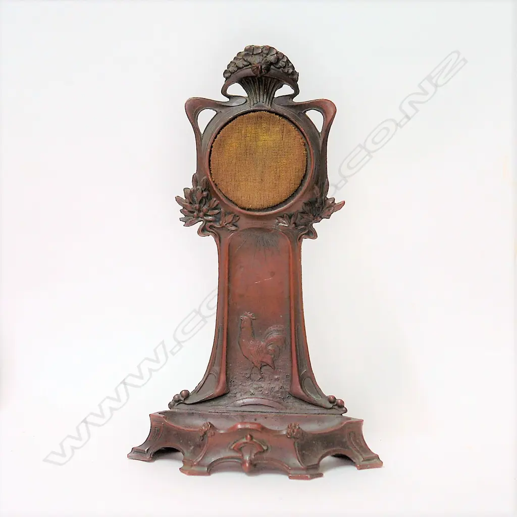 A French Art Nouveau bronzed spelter pocket watch stand Image 1++
