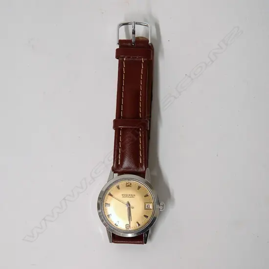 A vintage Huguenin automatic gent's wristwatch