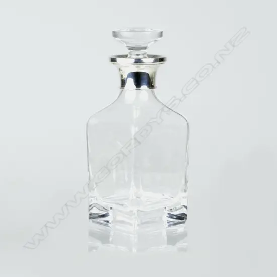 A plain square section crystal scent bottle with silver collar