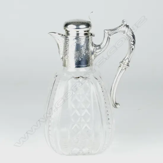 An Edwardian cut crystal claret jug