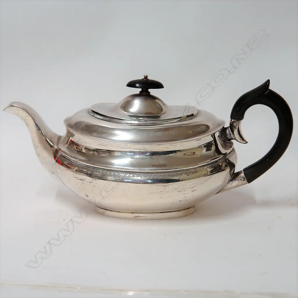 A mid-20thC silver teapot Image 1++