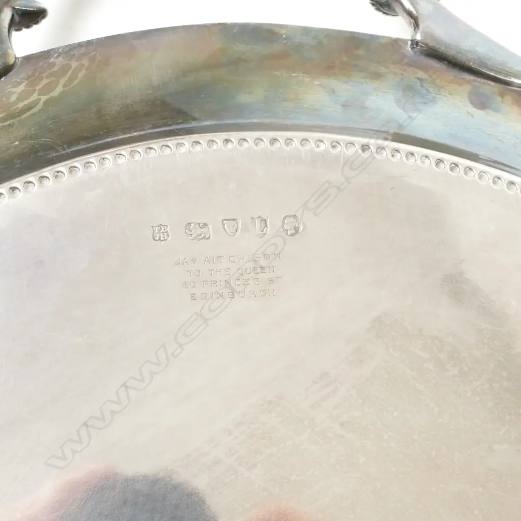 An impressive and heavy Victorian silver banqueting tray Image 1++