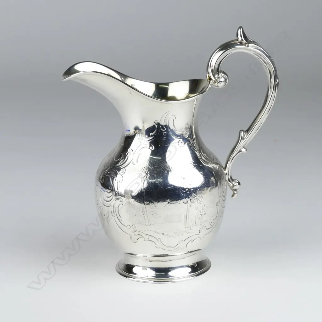 A Victorian silver milk jug Image 1++