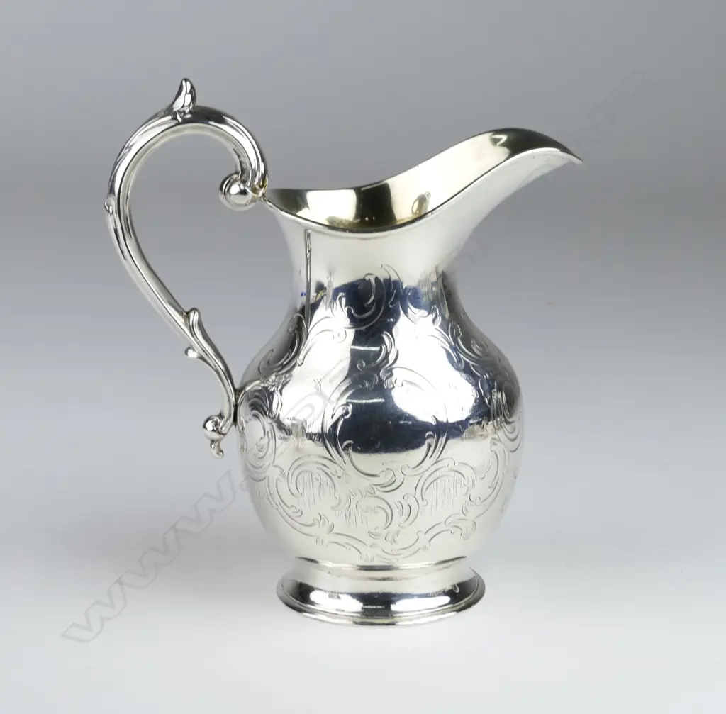 A Victorian silver milk jug Image 1++