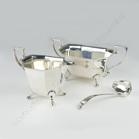 A silver milk jug