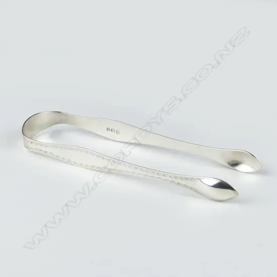 A pair of silver George III sugar tongs