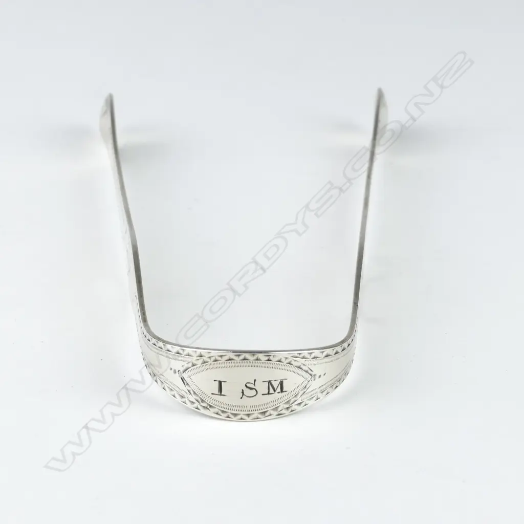 A pair of George III silver sugar tongs Image 1++