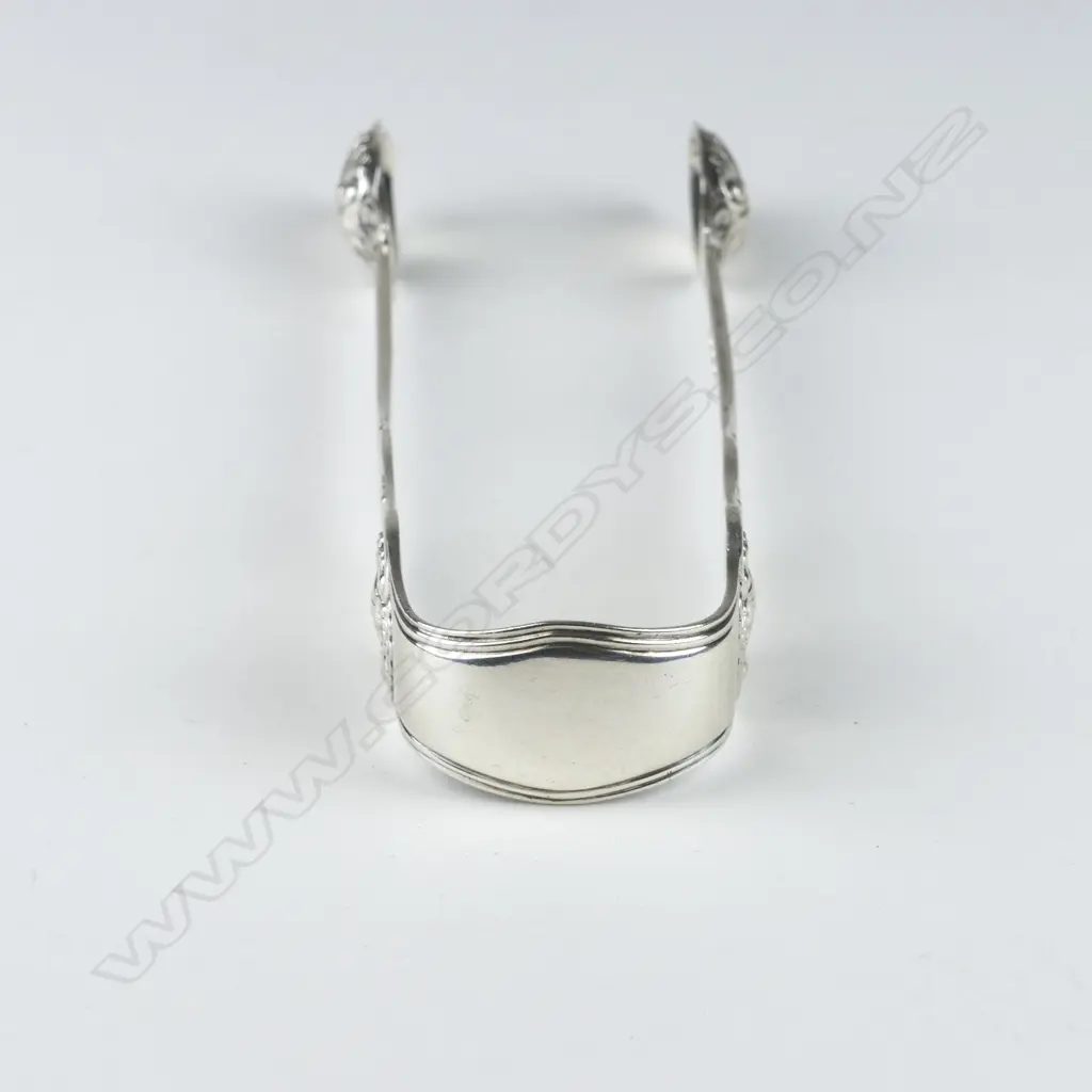 A pair of William IV silver sugar tongs Image 1++