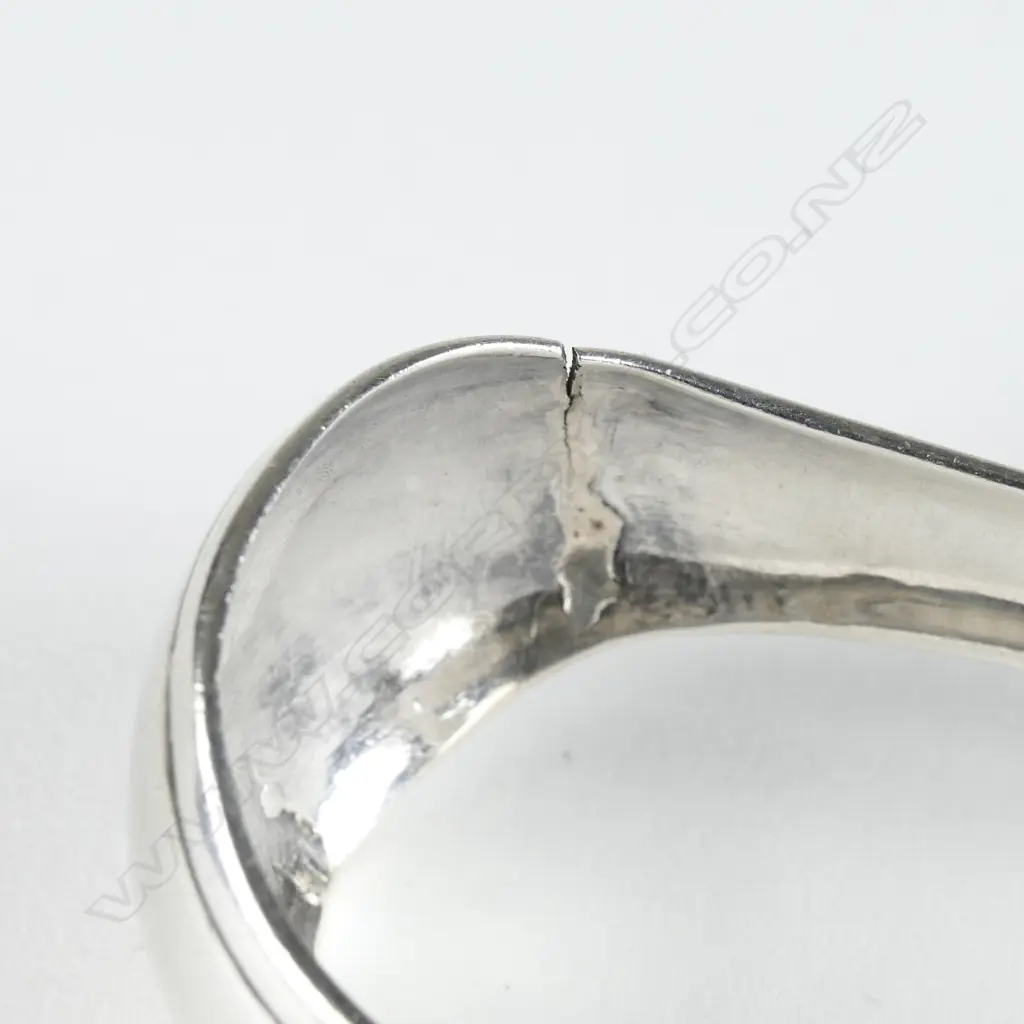 A pair of late George III Scottish silver sugar tongs Image 1++