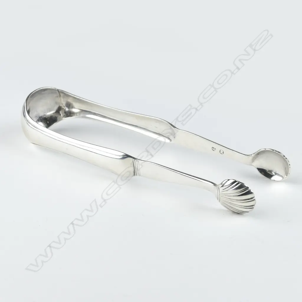 A pair of late George III Scottish silver sugar tongs Image 1++