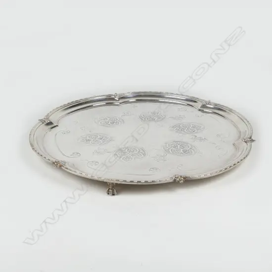 A large late Victorian silver plated circular tray