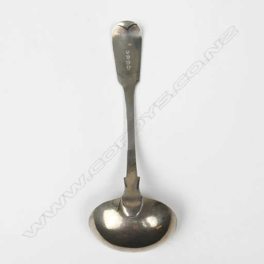 A silver ladle Image 1++