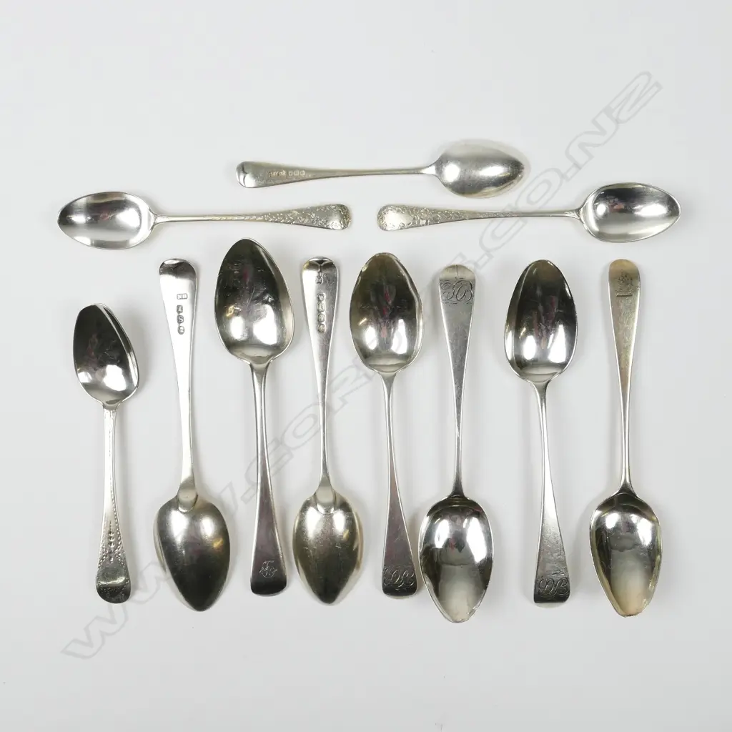 Eleven silver teaspoons Image 1++