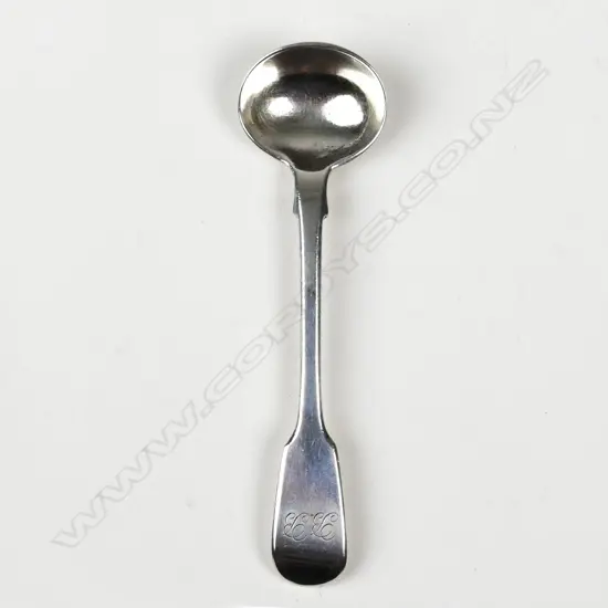 A silver mustard spoon
