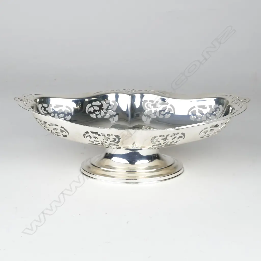 A silver fruit bowl on stand Image 1++
