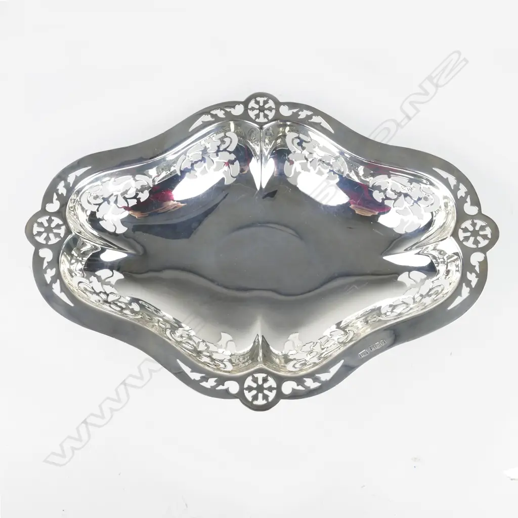 A silver fruit bowl on stand Image 1++