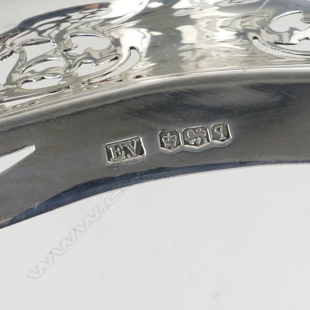A silver fruit bowl on stand Image 1++