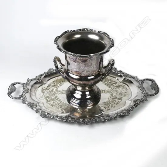 A silver plated wine cooler