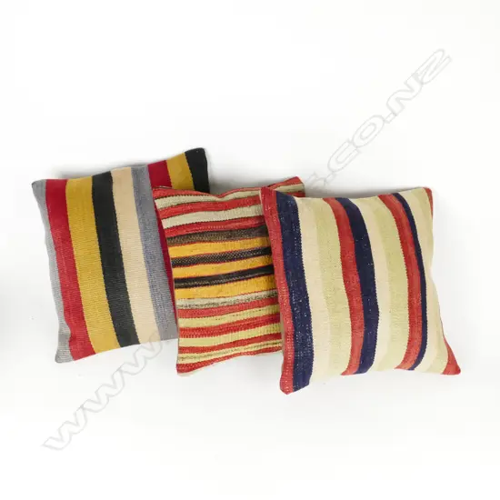 Three kilim cushions
