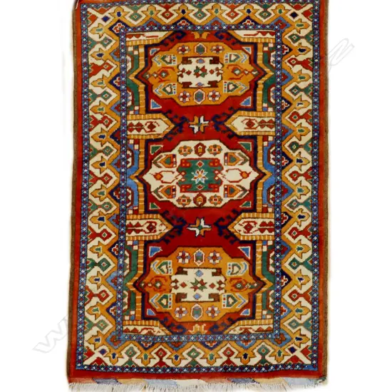 A small hand knotted Afghan rug