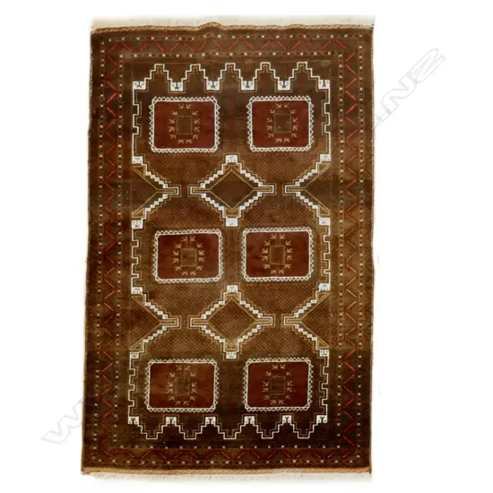 A hand knotted Baluchi tribal rug
