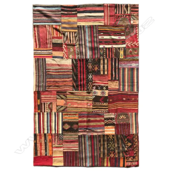 A large Turkish patchwork kilim carpet