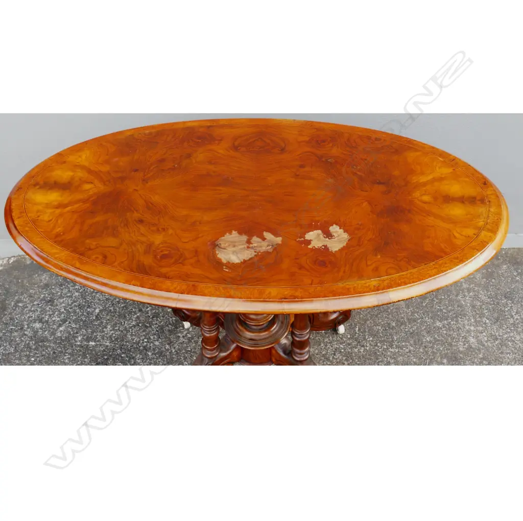A Victorian walnut occasional table Image 1++