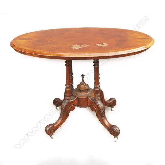 A Victorian walnut occasional table