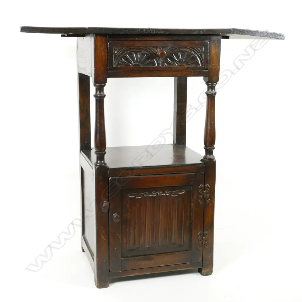 An oak Tudor style cabinet Image 1++