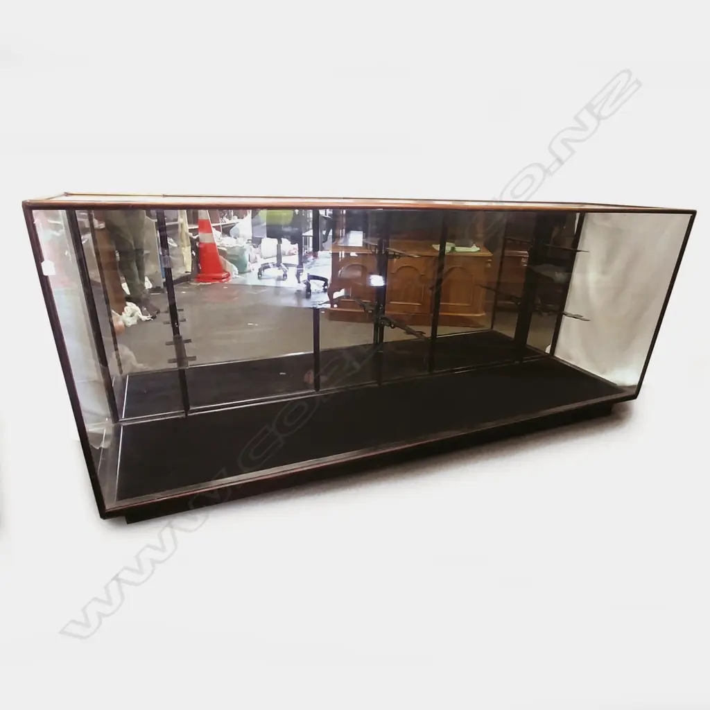 A long low vintage kauri shop display cabinet with glass sides Image 1++