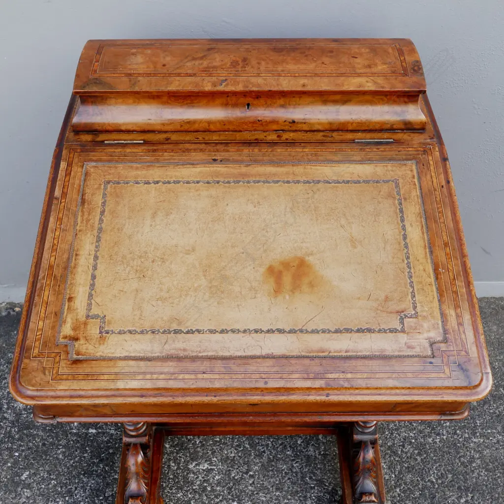 A Victorian walnut davenport Image 1++