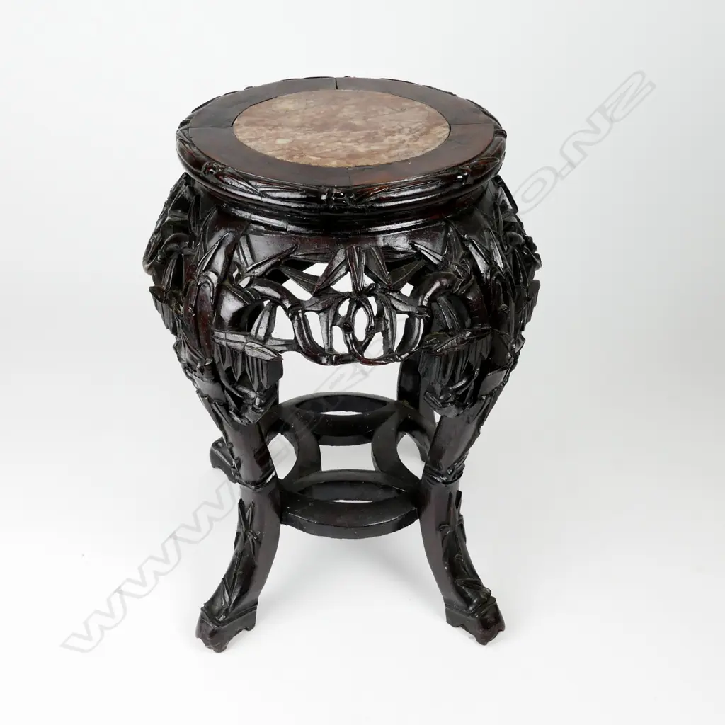 A Chinese hardwood vase stand Image 1++