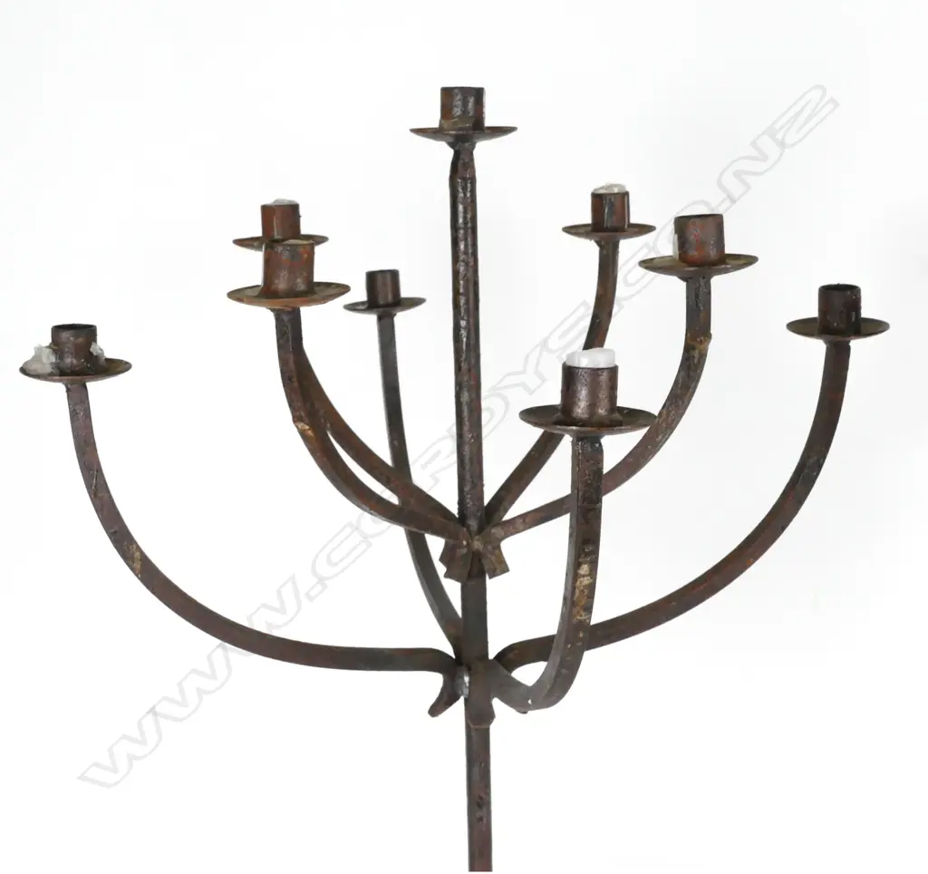 A pair of cast iron candelabra Image 1++