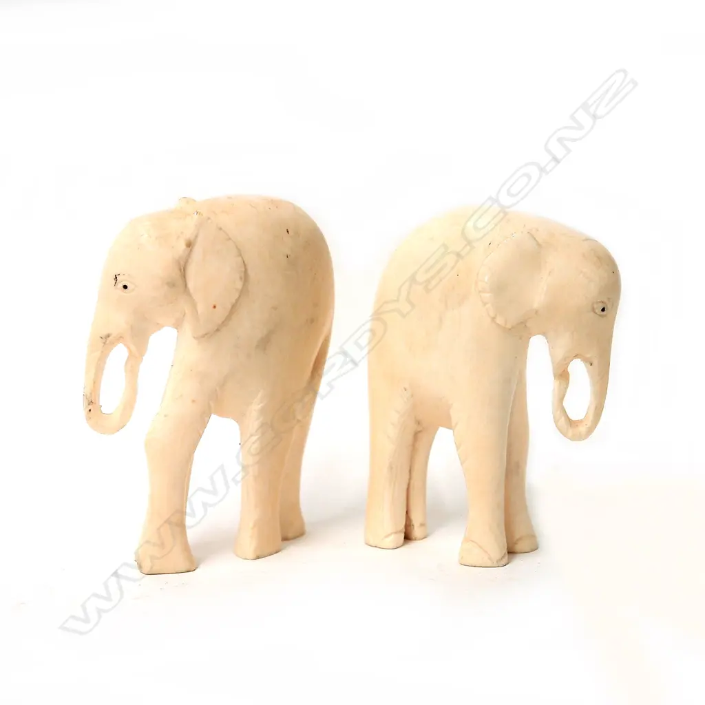 Two vintage African carved ivory elephants Image 1++
