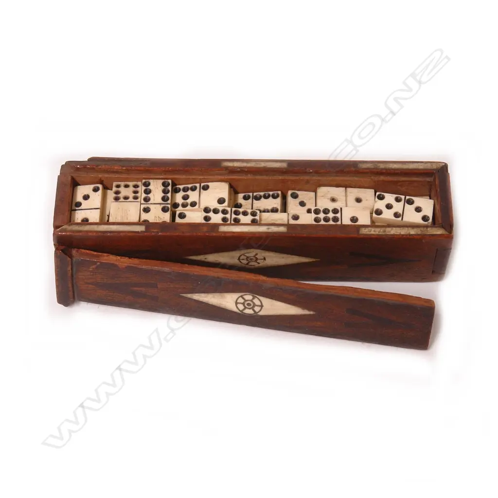 A 19thC/20thC Prisoner-of-War carved bone domino set in wood box Image 1++