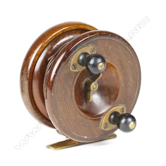 A 3½" oak wood trout fly reel