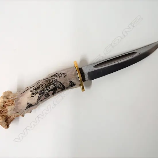 A Hubertus Solingen scrimshaw handled knife