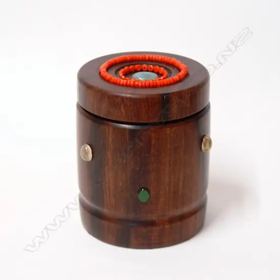 A 20thC jewelled turned ebony heavy lidded canister